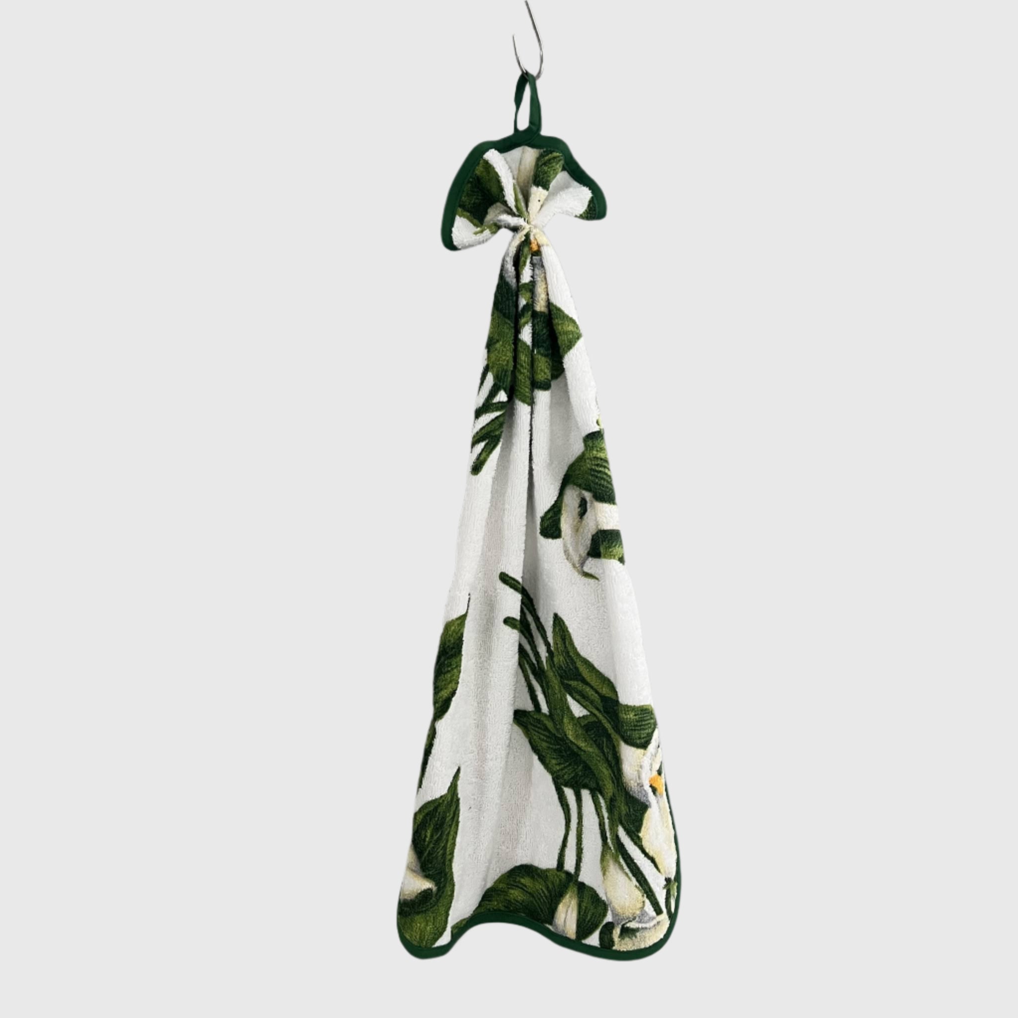 Floral patterned curled towel with white flowers and green leaves