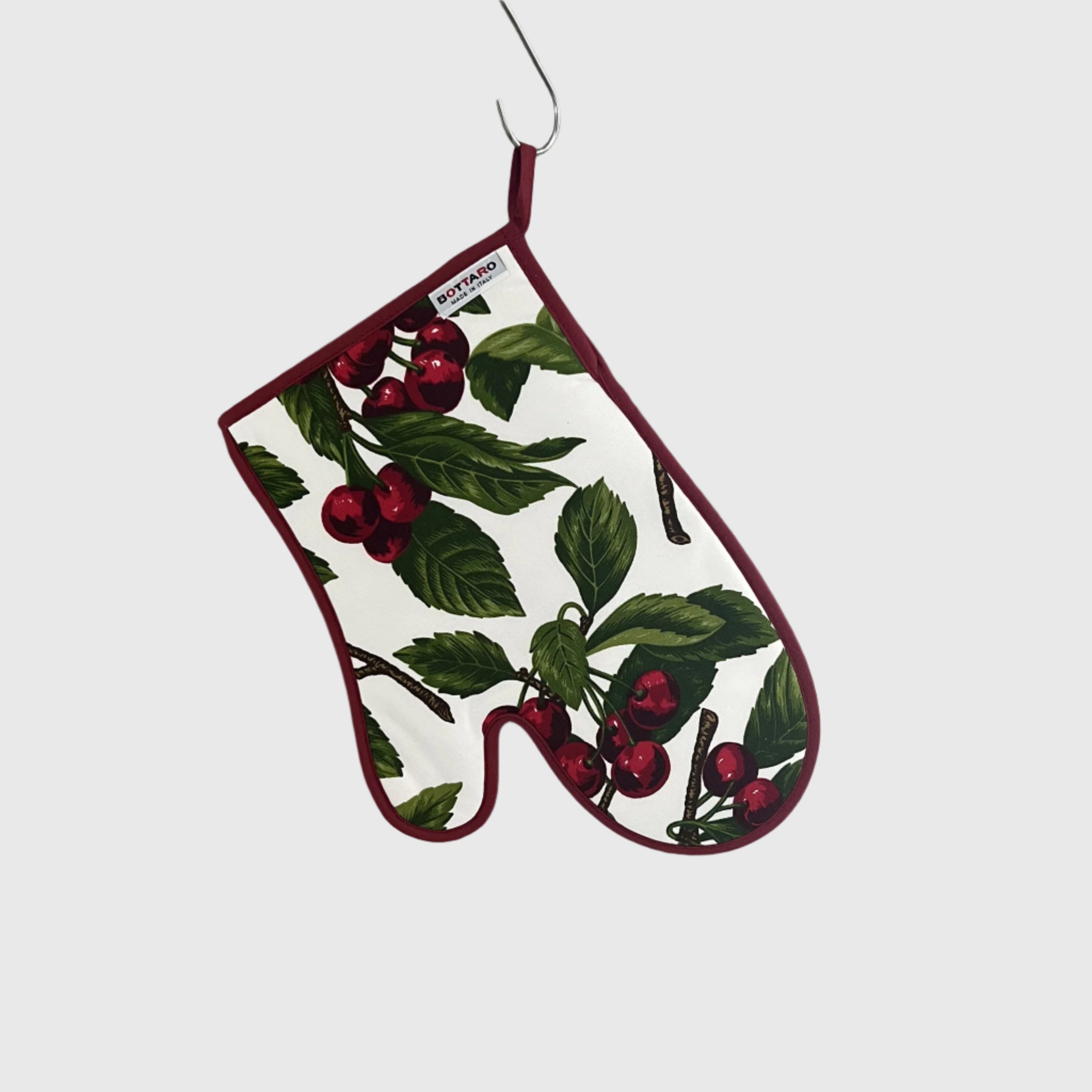 Oven glove with red cherry design