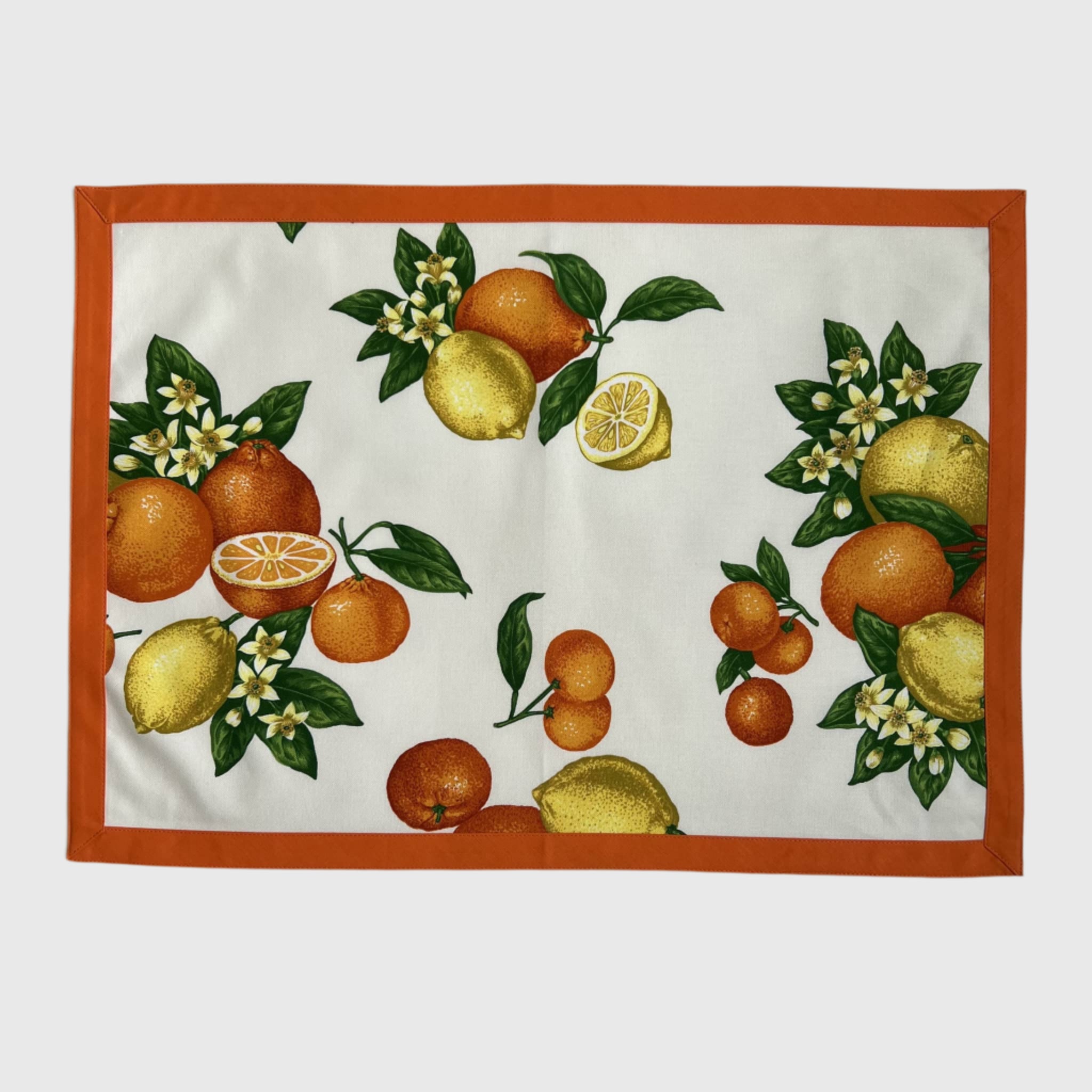 Placemat with a design of oranges, lemons, and flowers